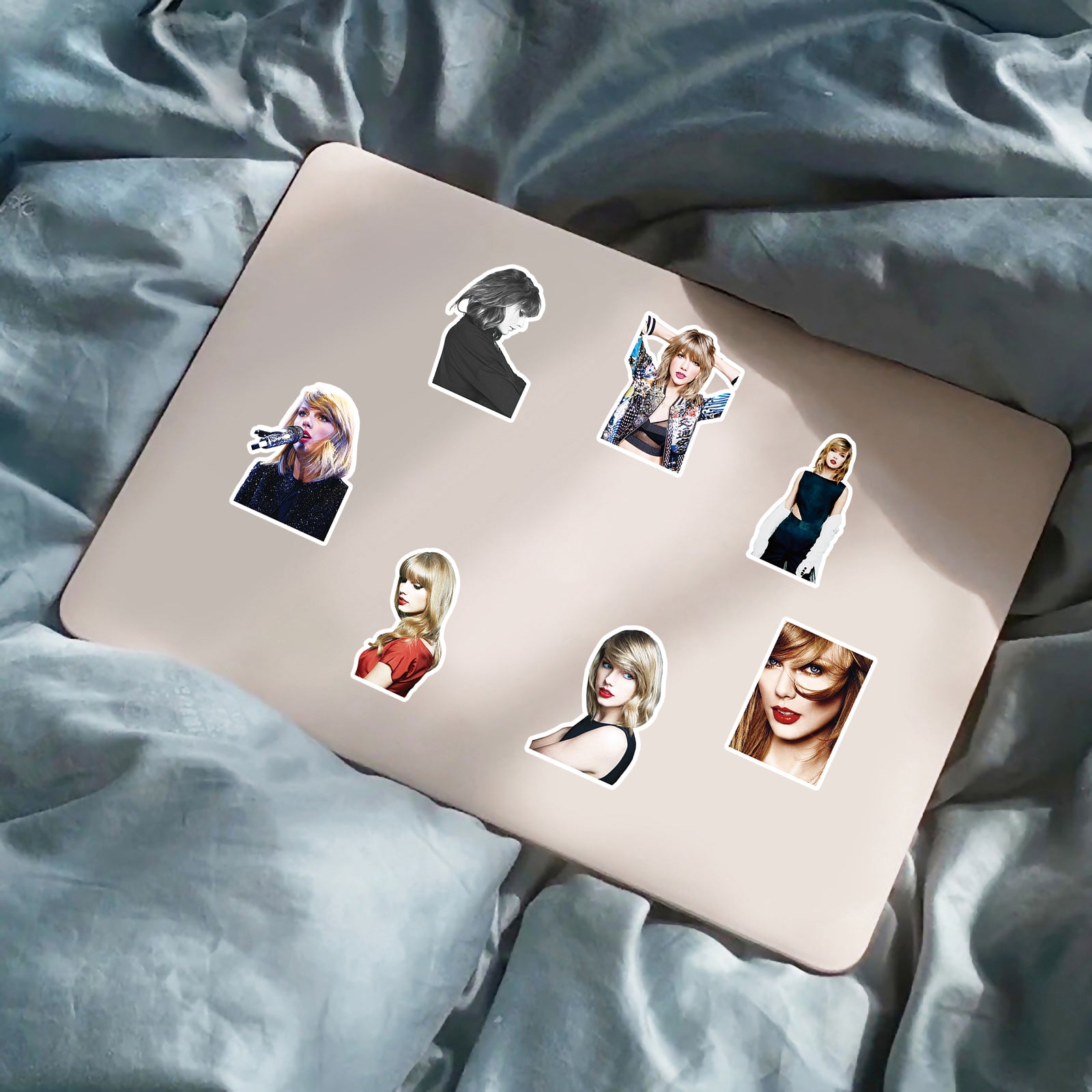 50Pcs Taylor Swift Sticker Set featuring vibrant designs for laptops, water bottles, and notebooks - PARTYMART NZ. Perfect for Swifties, party favors, and birthday gifts.
